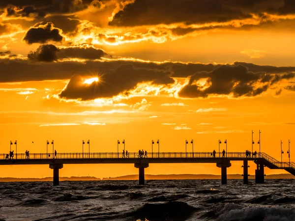 Sunset over Miedzyzdroje Pier, Baltic Sea, Poland — Stock Photo, Image