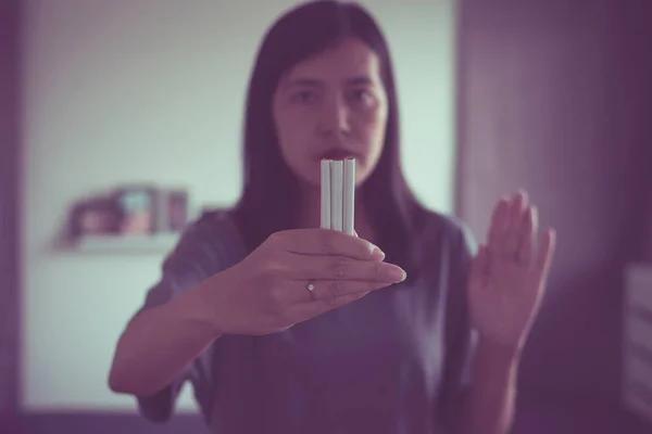 Asian woman showing hands stop to cigarette,Concept no smoking day world quitting world no tobacco in 31 may day