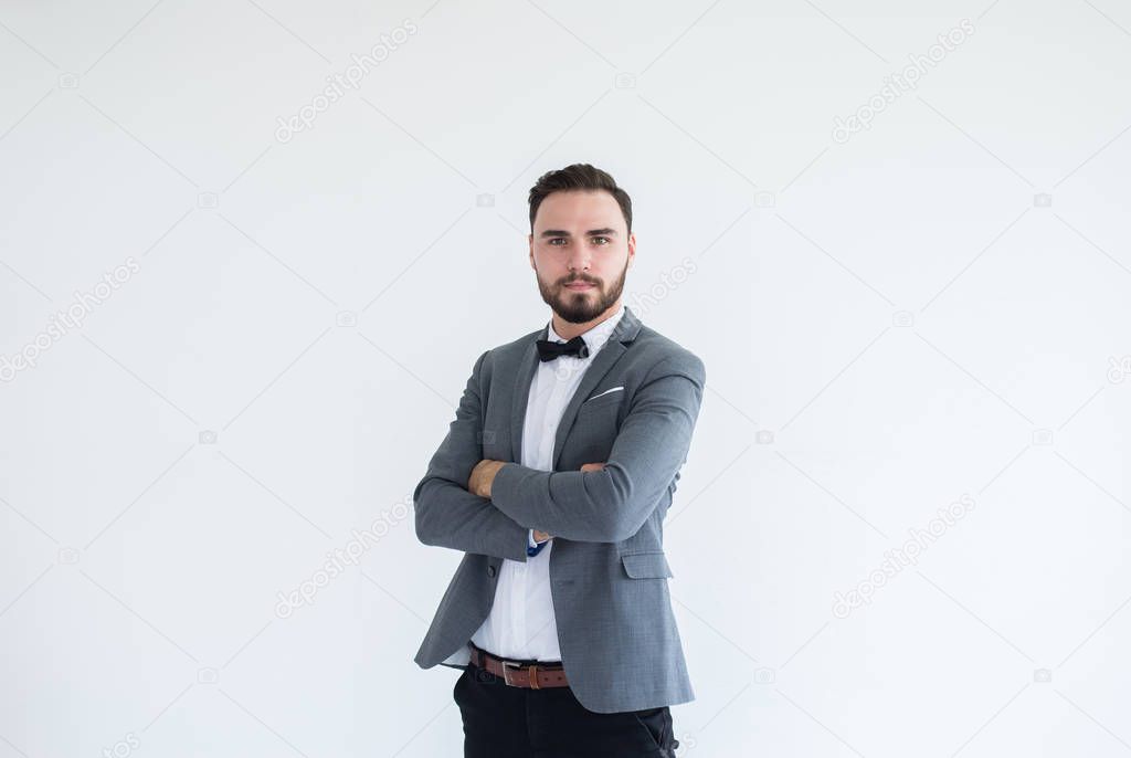 Handsome caucasian men with beard in formal tuxedo and suit standing and cross arms on white background,Copy space for text and die cut