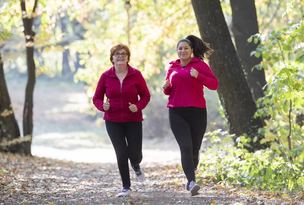 Mother Daughter Wearing Sportswear Running Forest Mountain — Stock Photo, Image