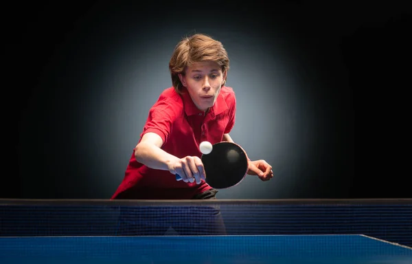 Young boy playing ping pong table tennis — Stock Photo, Image