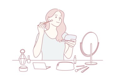 Güzellik, cilt bakımı ve makyaj konsepti. Genç, güzel bir kız çizgi film karakteri oturmuş ayna vektör çizimine bakarak fırçayla makyaj yapıyor.