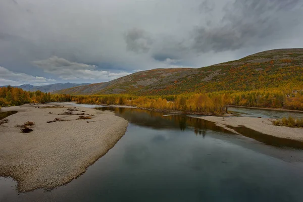 Russia. far East. The colours of autumn are cold-water rivers of Magadan.