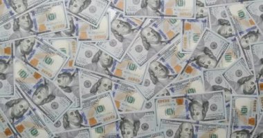 Arka planda bir sürü 100 dolarlık banknot, 4k çözünürlük yakınlaştır.
