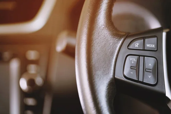 Close Modern Black Steering Wheel Multifunction Buttons Integrated Stereo Controls — Stock Photo, Image