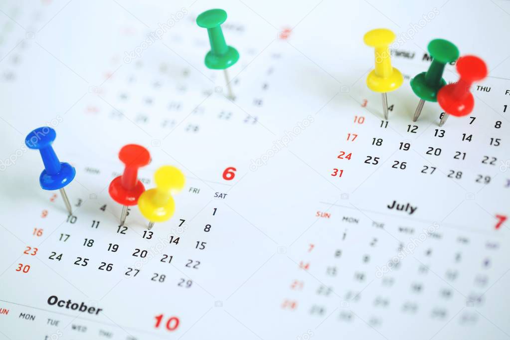 mark the event day with a pin. Thumbtack in calendar concept for busy timeline organize schedule,appointment and meeting reminder. planning for business meeting or travel holiday planning concept.