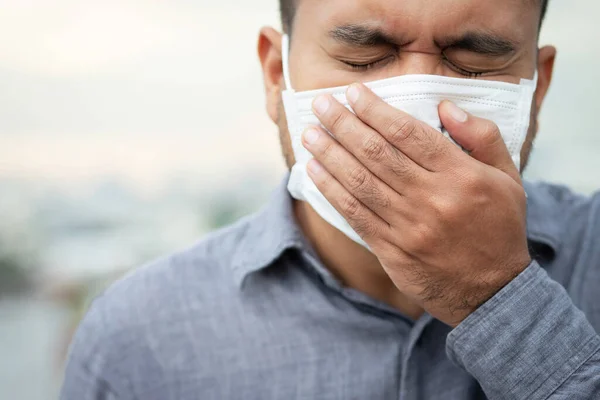 Men wearing masks to protect the corona virus