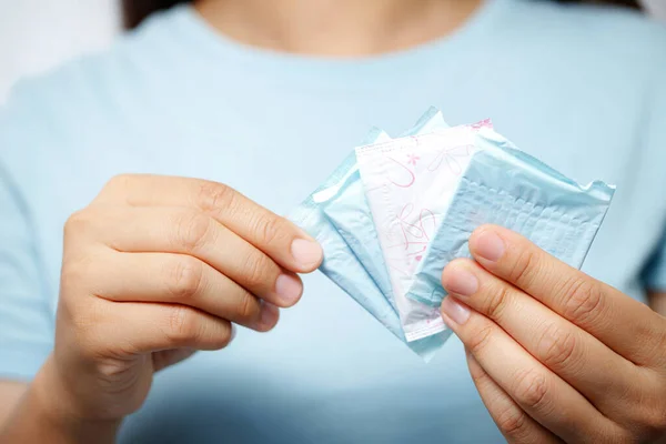Women carry sanitary napkins She is menstrual