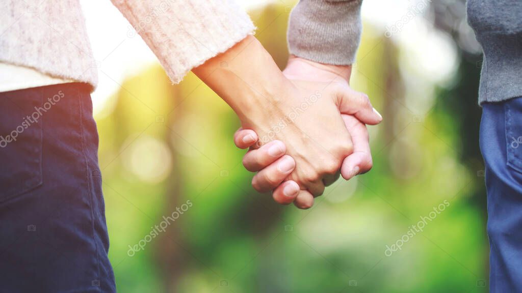 Couple hand shake with a little love on Valentines day