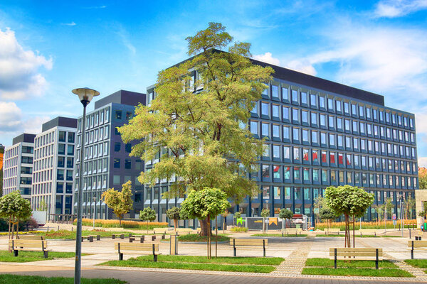WROCLAW, POLAND - JULY 28, 2018: Green Day Offices (built in 2012-2014) and Green 2Day Offices (built in 2017) in Wroclaw. Architects: Mackow Pracownia Projektowa, Wroclaw, Poland.