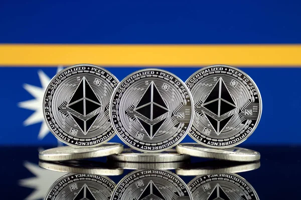 Physical version of Ethereum (ETH) and Nauru Flag. Conceptual image for investors in cryptocurrency, Blockchain Technology, Smart Contracts, Personal Tokens and Initial Coin Offering.