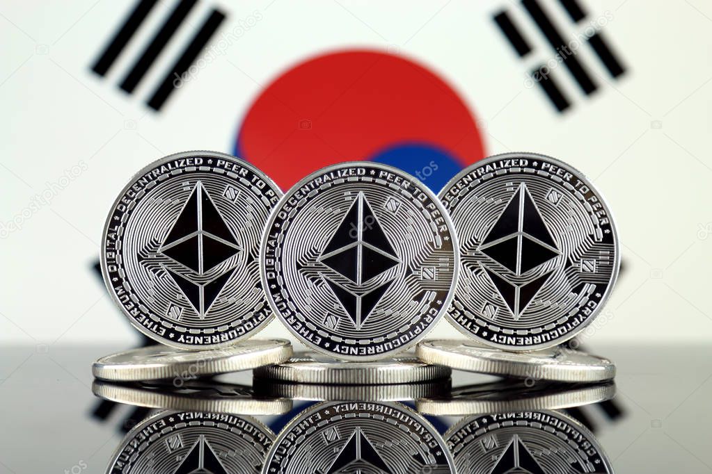 Physical version of Ethereum (ETH) and South Korea Flag. Conceptual image for investors in cryptocurrency, Blockchain Technology, Smart Contracts, Personal Tokens and Initial Coin Offering.