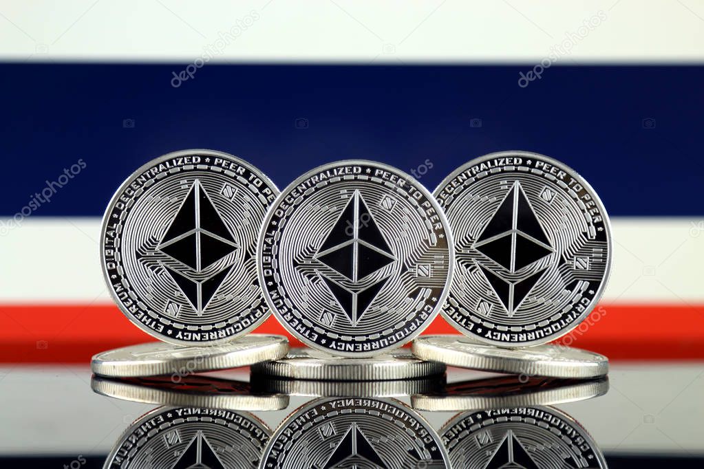 Physical version of Ethereum (ETH) and Thailand Flag. Conceptual image for investors in cryptocurrency, Blockchain Technology, Smart Contracts, Personal Tokens and Initial Coin Offering.