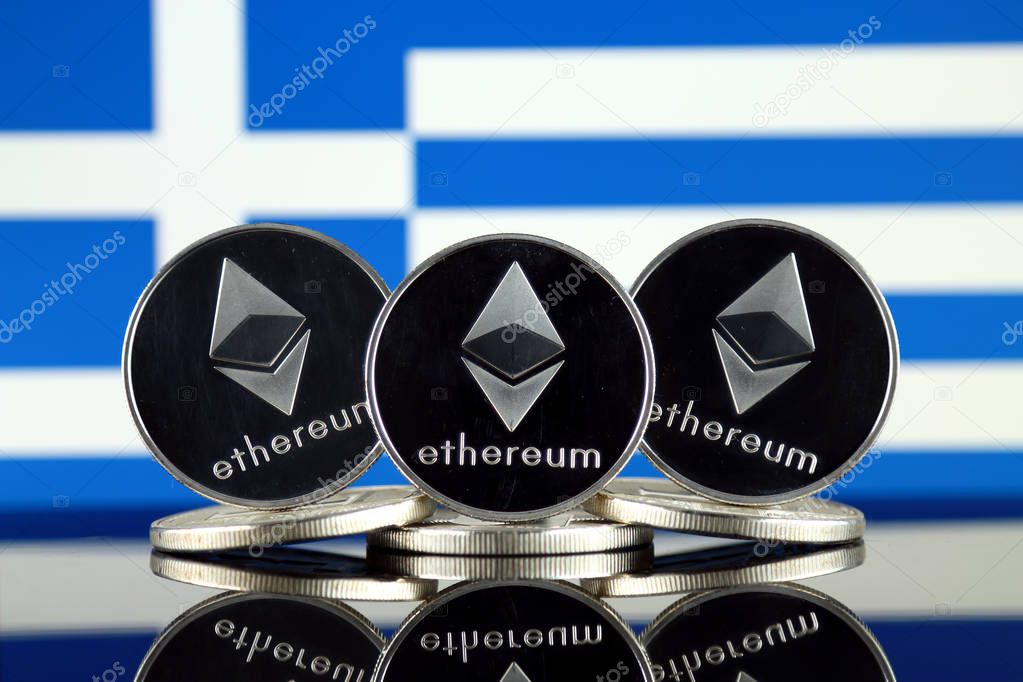 Physical version of Ethereum (ETH) and Greece Flag. Conceptual image for investors in cryptocurrency, Blockchain Technology, Smart Contracts, Personal Tokens and Initial Coin Offering.