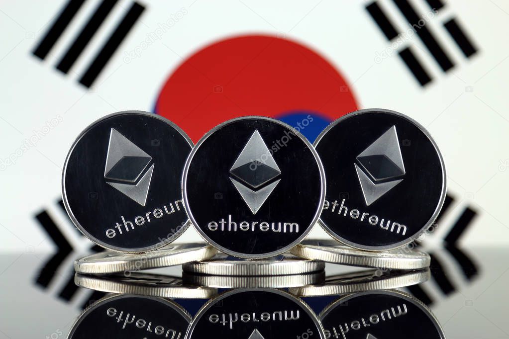 Physical version of Ethereum (ETH) and South Korea Flag. Conceptual image for investors in cryptocurrency, Blockchain Technology, Smart Contracts, Personal Tokens and Initial Coin Offering.