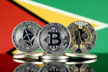 Ethereum (Eth), Bitcoin (Btc), dalgalanma (Xrp) ve Guyana bayrağı fiziksel sürümü. En iyi 3 Cryptocurrencies pazara göre kap.
