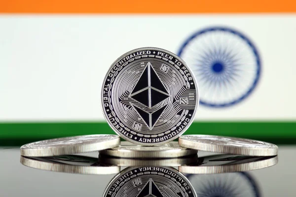 Physical version of Ethereum (ETH) and India Flag. Conceptual image for investors in cryptocurrency, Blockchain Technology, Smart Contracts, Personal Tokens and Initial Coin Offering.