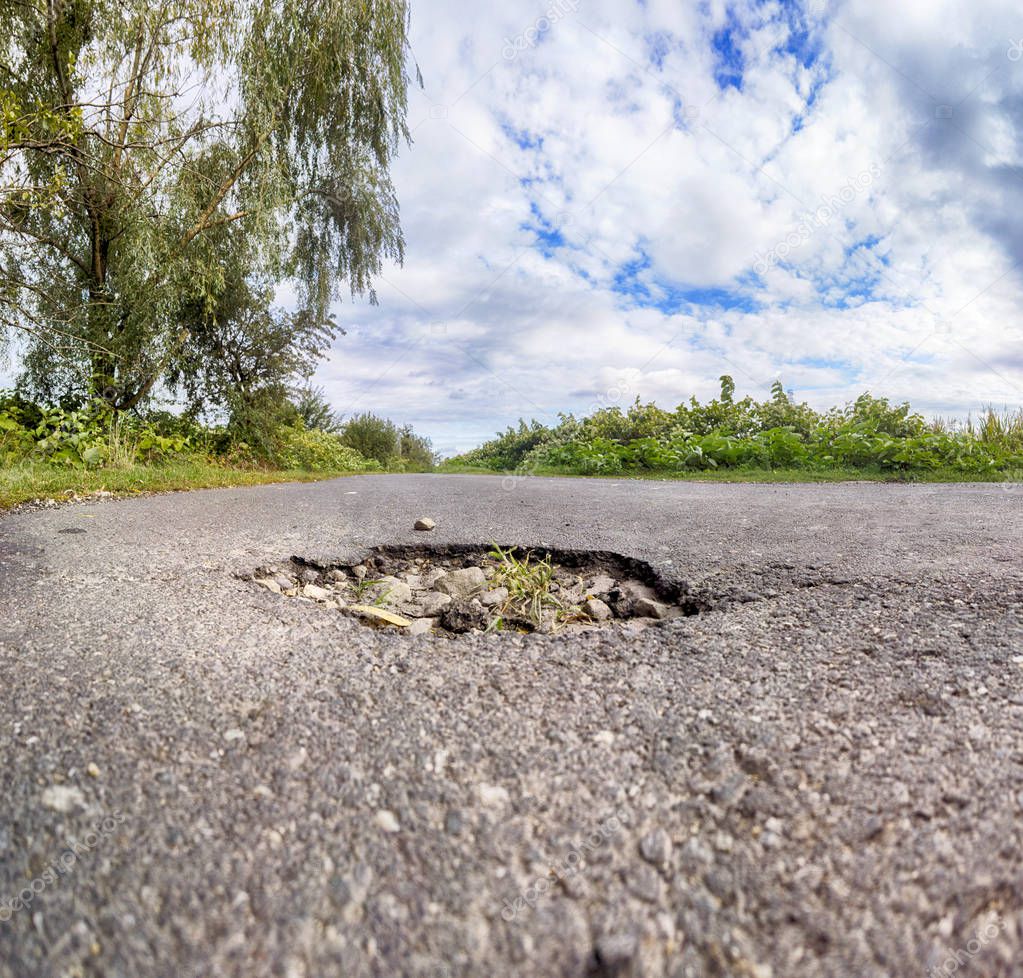 Dangerous hole in the road.