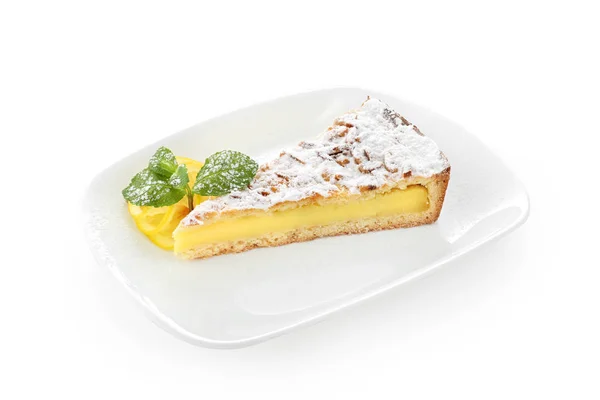 Lemon cake on a white plate — Stock Photo, Image