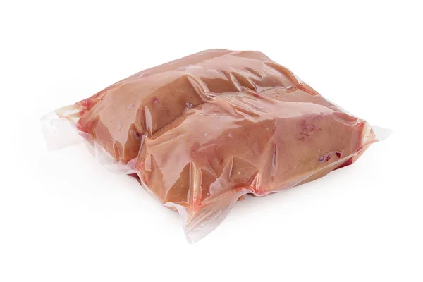 Ovos de bovinos crus testículos de touro em embalagem a vácuo sobre fundo branco isolado — Fotografia de Stock