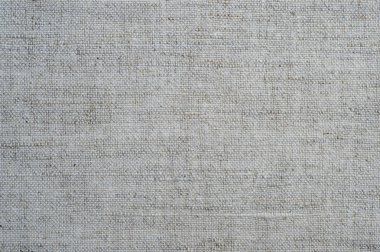 Keten kumaş dokusuna yakın çekim. Arka plan. Doğal malzemeler dokuma.