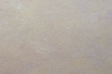 Kahverengi duvar bir çözüm kil beyaz lekeler ile süslenmiş. Doku, duvar kağıdı.