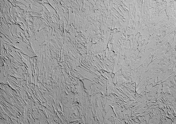 Wallpaper texture of frozen clay on the wall. Black and white background.