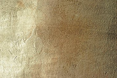 Beton aydınlatma gradyan ile sarı kahverengi duvar boyalı. Arka plan.