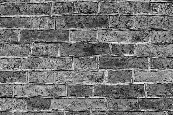 各れんが造りの古い建物の装飾的な石積みモルタルでレンガの壁 背景黒と白 — ストック写真