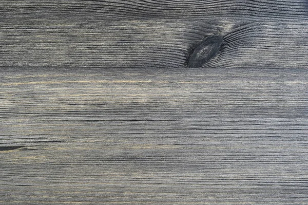 Distressed rustic wood background with a knot of gray-brown color with a beige shade — Stock Photo, Image