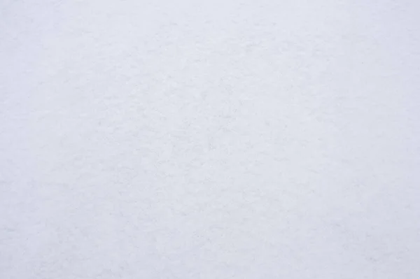 Fondo blanco con un tinte azulado de suave superficie de nieve —  Fotos de Stock