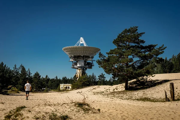 A huge soviet radio telescope near abandoned military town Irbene in Latvia. Former super-secret Soviet Army space spying object.Now largest radio telescope in northern Europe and the worlds eighth — Stock Photo, Image