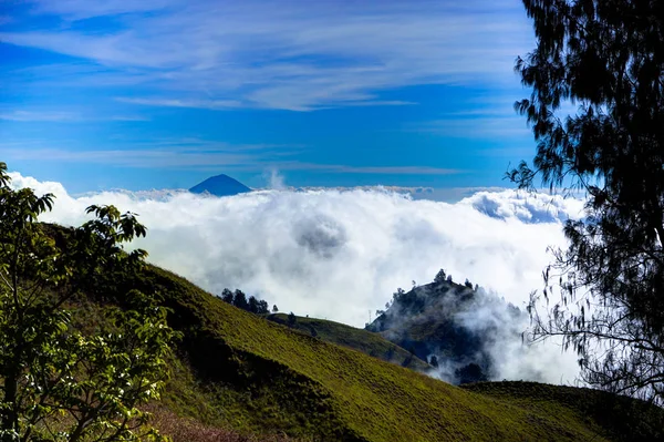 View over clouds from Mountain blue sky Mount Rinjani Lombok Ind — Stock Photo, Image