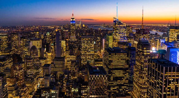 Photo taken in New York USA, August 2017: New York Skyline Manhatten Cityscape Empire State Building from Top of the Rock Sunset