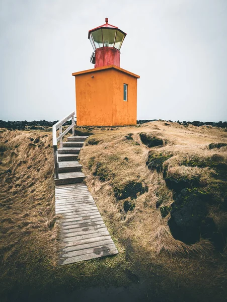 Orange Lighthouse Svortuloft Skalasnagi tower in Snaefellsnes Peninsula, west Iceland on an overcast day. — Stock Photo, Image