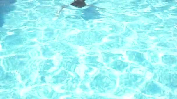 Happy active teen girl in the swimming pool, 4k, slow-motion — Stock Video