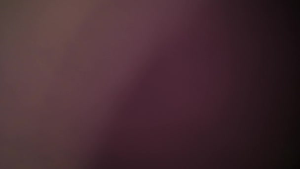 Fundo Abstrato Desfocado - Cores vivas, borrão, brilho de cor. fundo roxo. 4K. espaço de cópia — Vídeo de Stock