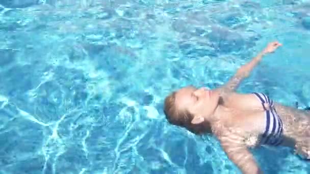 Young Beautiful Reclining Woman Bathing Suit Lying Water Outdoors Slow — Stock Video