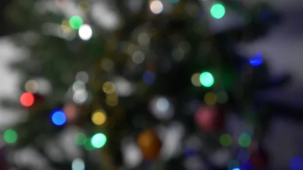 Abstracte wazig Christmas Lights Bokeh achtergrond. Knipperende lichtjes van de kerstboom fonkelende. Winter vakantie Concept. — Stockfoto