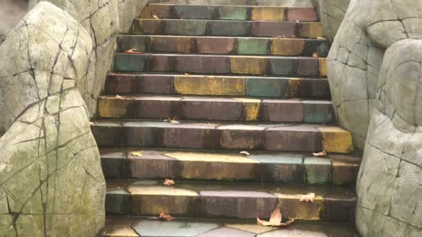 Multi colored tile pattern. abstract colorful tiled floor. decoration of the stairs in the park. — Stock Video