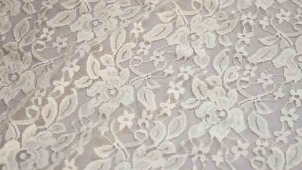 Fabric background. white lace pattern. texture, close-up — Stock Video