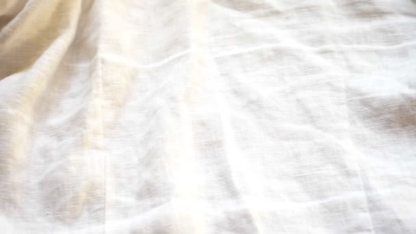 Tło z białą, bawełnianą tkaninę. szczelnie-do góry. tekstura tkanina. — Wideo stockowe