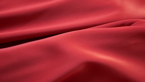 Background from bright satin fabric. close-up. Red color. fabric texture. — Stock Video