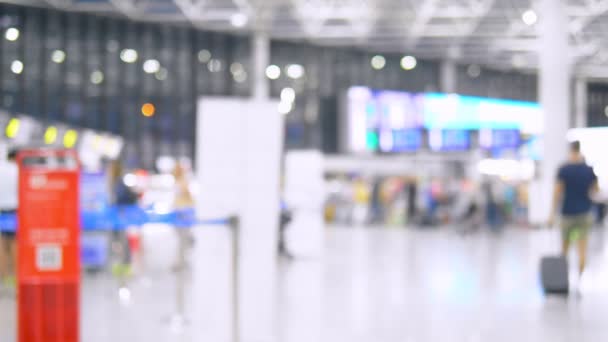 Abstract blurred background. airport lounge with passengers — Stock Video