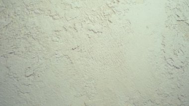 Arkaplan dokusu. Dekoratif desenli Venedik alçı bej rengi. yakın plan