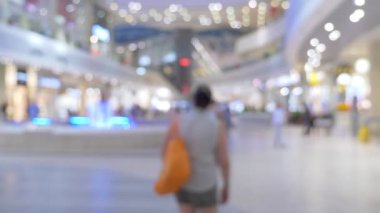 bulanık arka plan süpermarket ve insanlar. Soyut bokeh arka plan. moda için dokular.