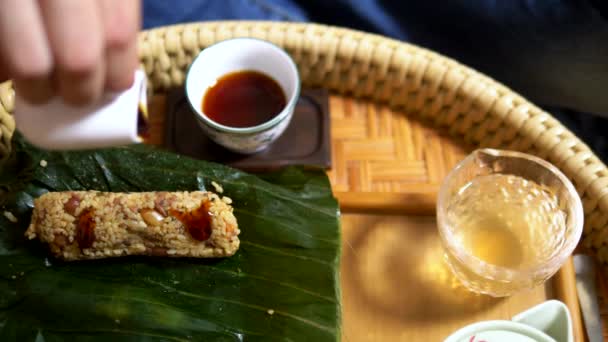 Diet food concept, vegetarianism. rice with mushrooms and peanuts in banana leaves. Chinese cuisine — Stock Video