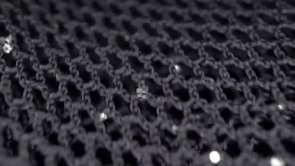 Macro. sfondo tessile. movimento del tessuto guipure nero con lurex — Video Stock