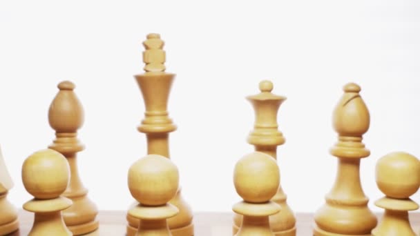 Super close Details of chess pieces that stand on a chessboard — Stock Video