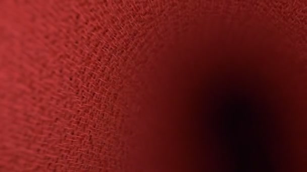 plis de tissu rouge. vue dans les plis. fond textile, espace de copie